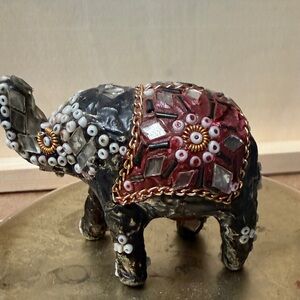 Decorative Elephant Figurine with Red and Black Accents